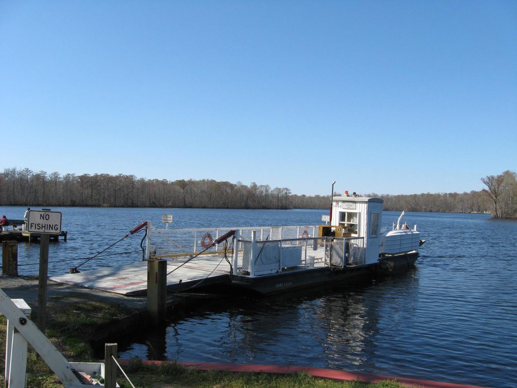 A boat dock above a river in Windsor Bertie.